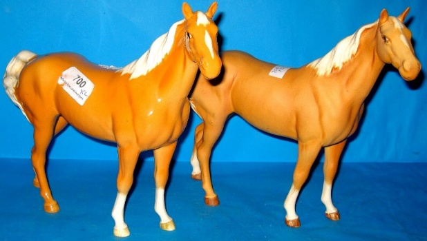 Appraisal: Beswick Palomino Swish Tail Horses In palomino Gloss and Palomino