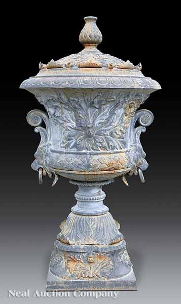 Appraisal: A Pair of Monumental Regency Cast Iron Garden Urns of