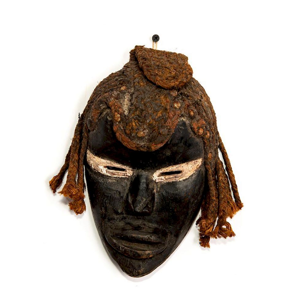 Appraisal: AFRICAN DAN MASK Hand carved with rope hair riveted in