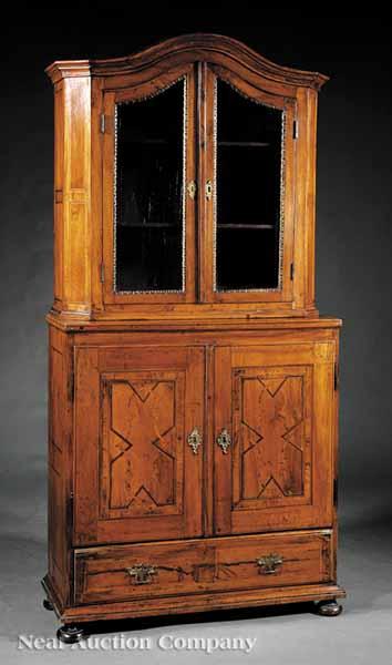 Appraisal: An Antique Continental Inlaid Walnut Cabinet arched cornice chamfered corners