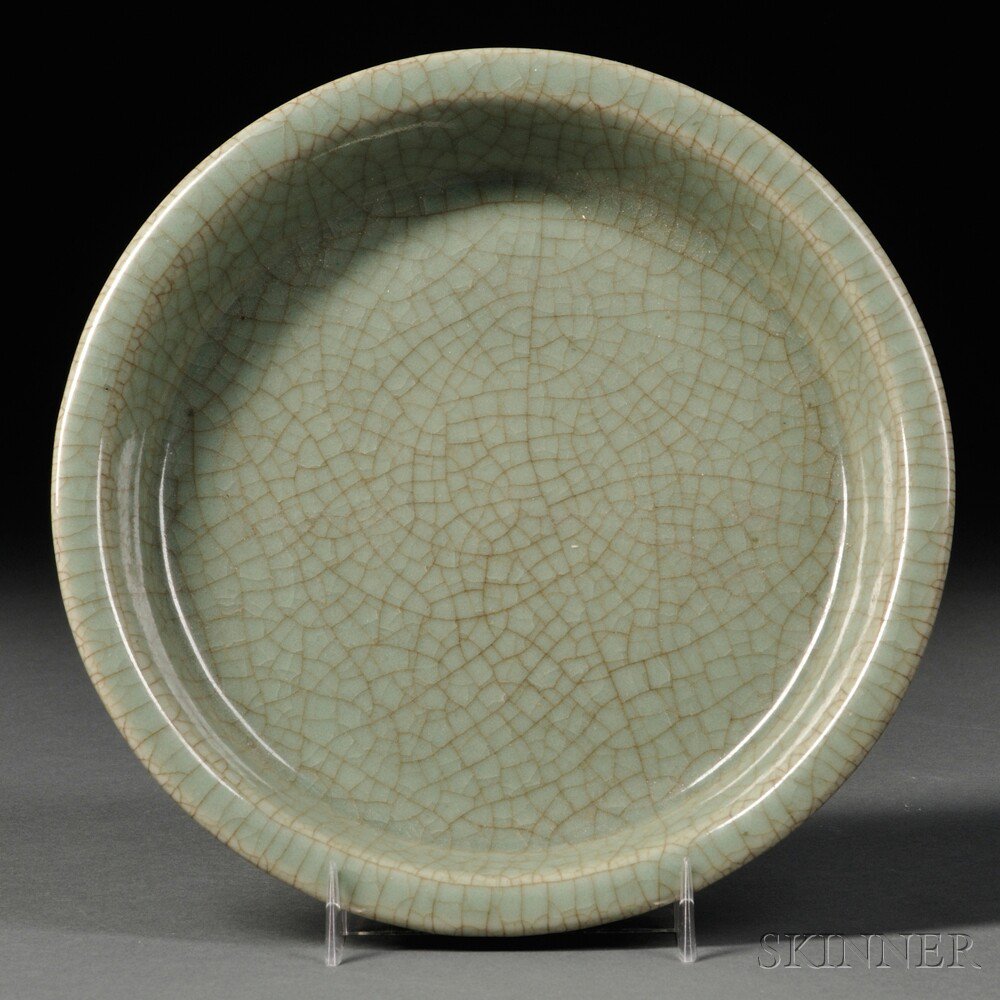 Appraisal: Celadon Dish China Ming Dynasty or later flat base with