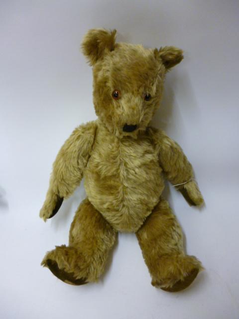 Appraisal: A Chiltern Hugmee teddy bear covered in long gold plush