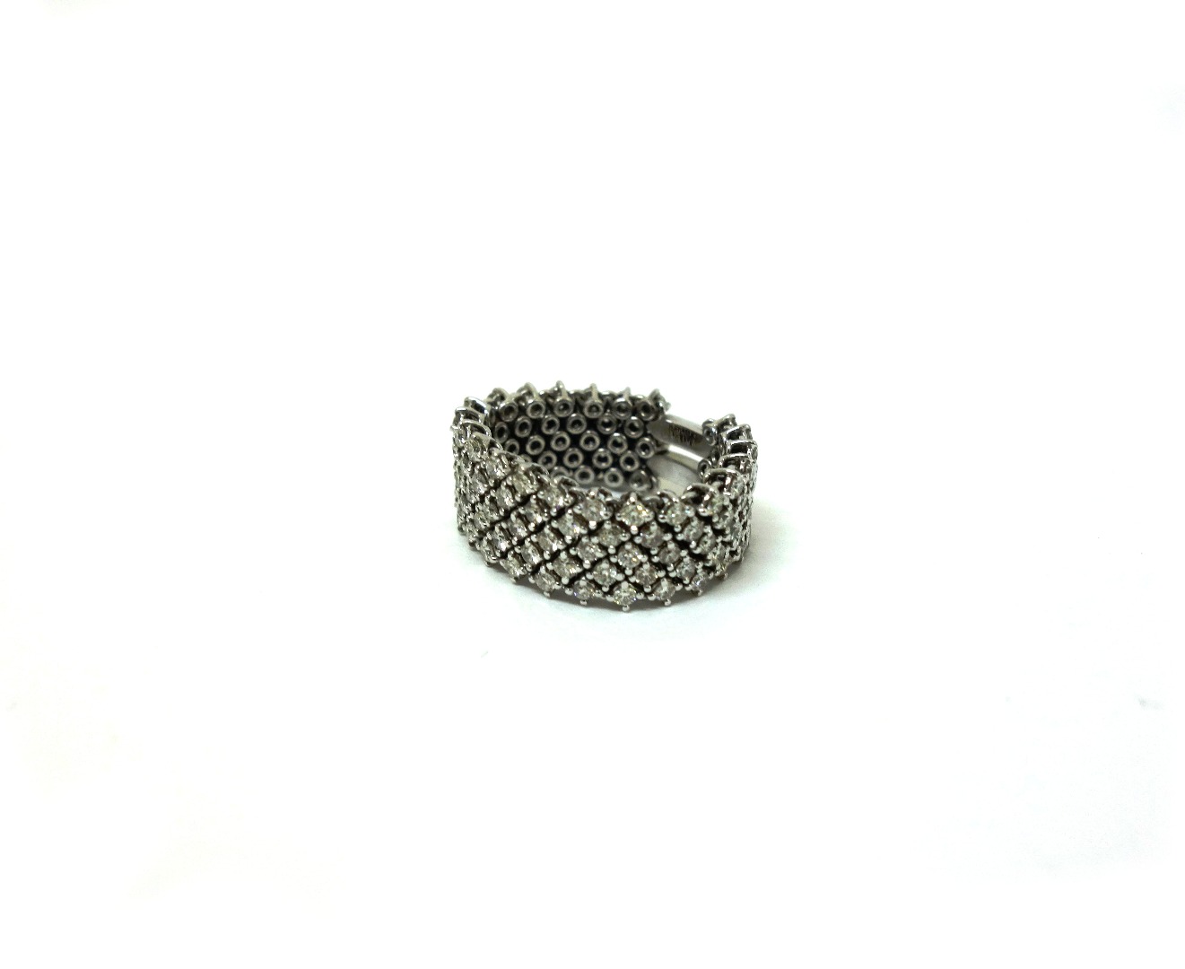 Appraisal: An Italian white gold and brilliant-cut diamond flexible band ring