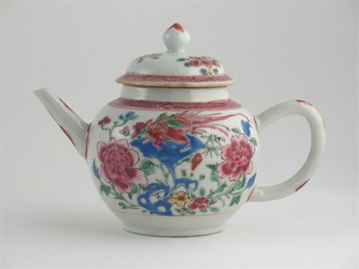 Appraisal: A Chinese famille rose teapot and cover painted with birds