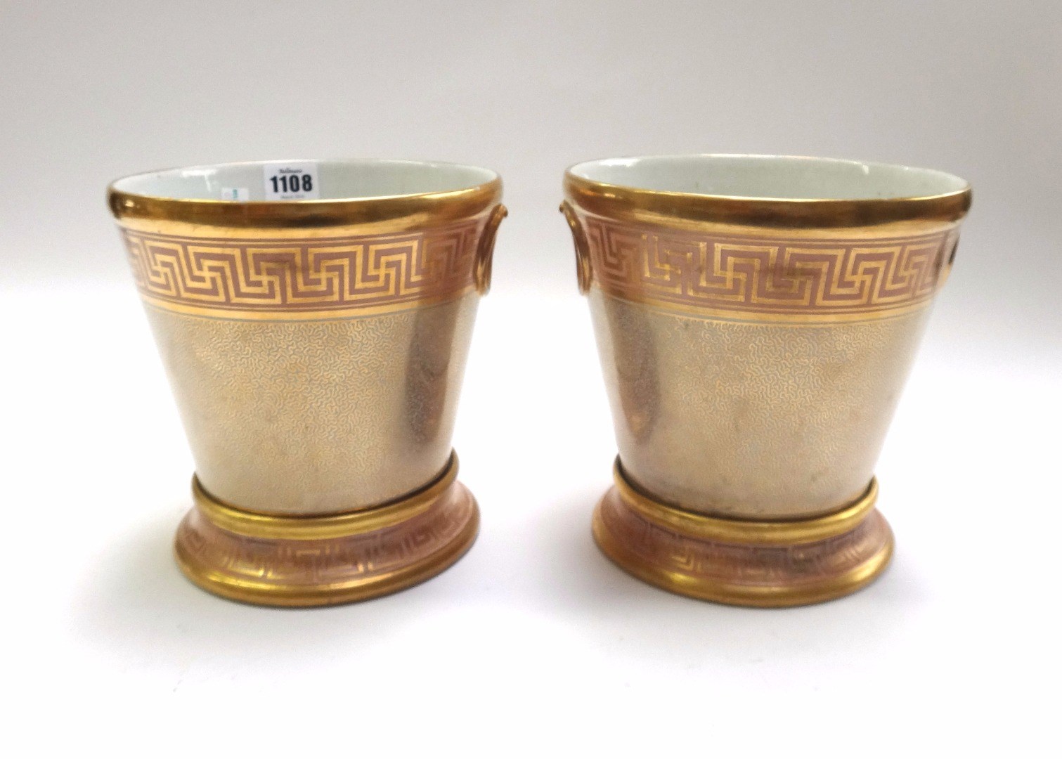 Appraisal: A pair of English porcelain jardinieres and stands circa possibly