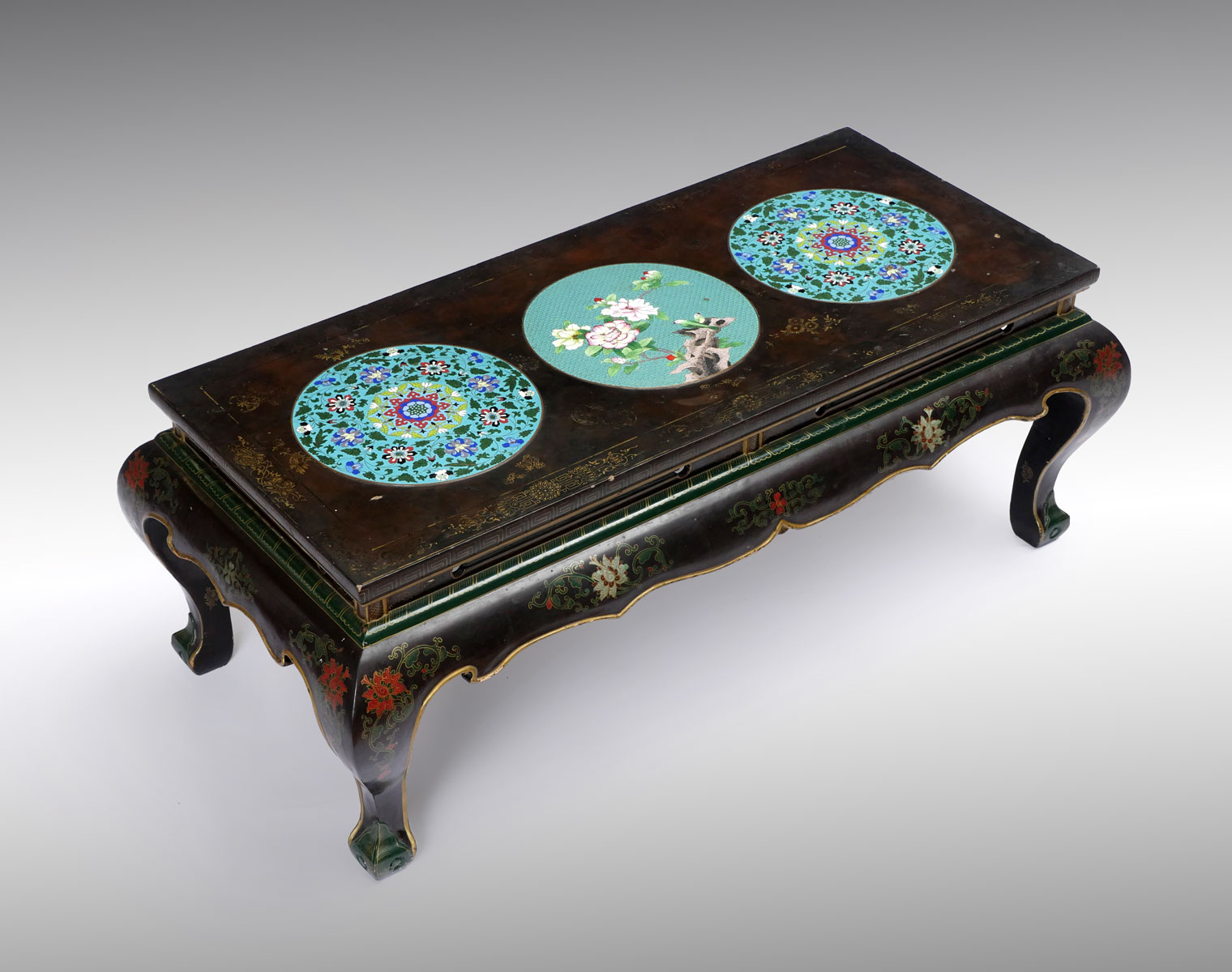 Appraisal: CLOISONNE PLAQUE COFFEE TABLE Chinese black lacquered coffee table having