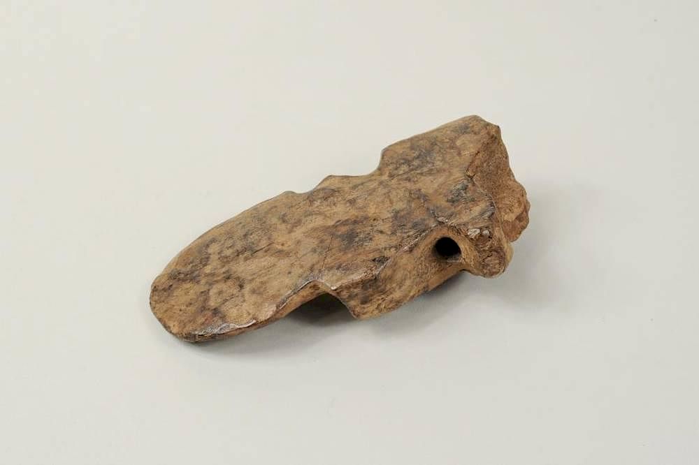 Appraisal: Inuit Fossilized Warriors' Spear Emblem Inuit fossilized warriors' spear emblem