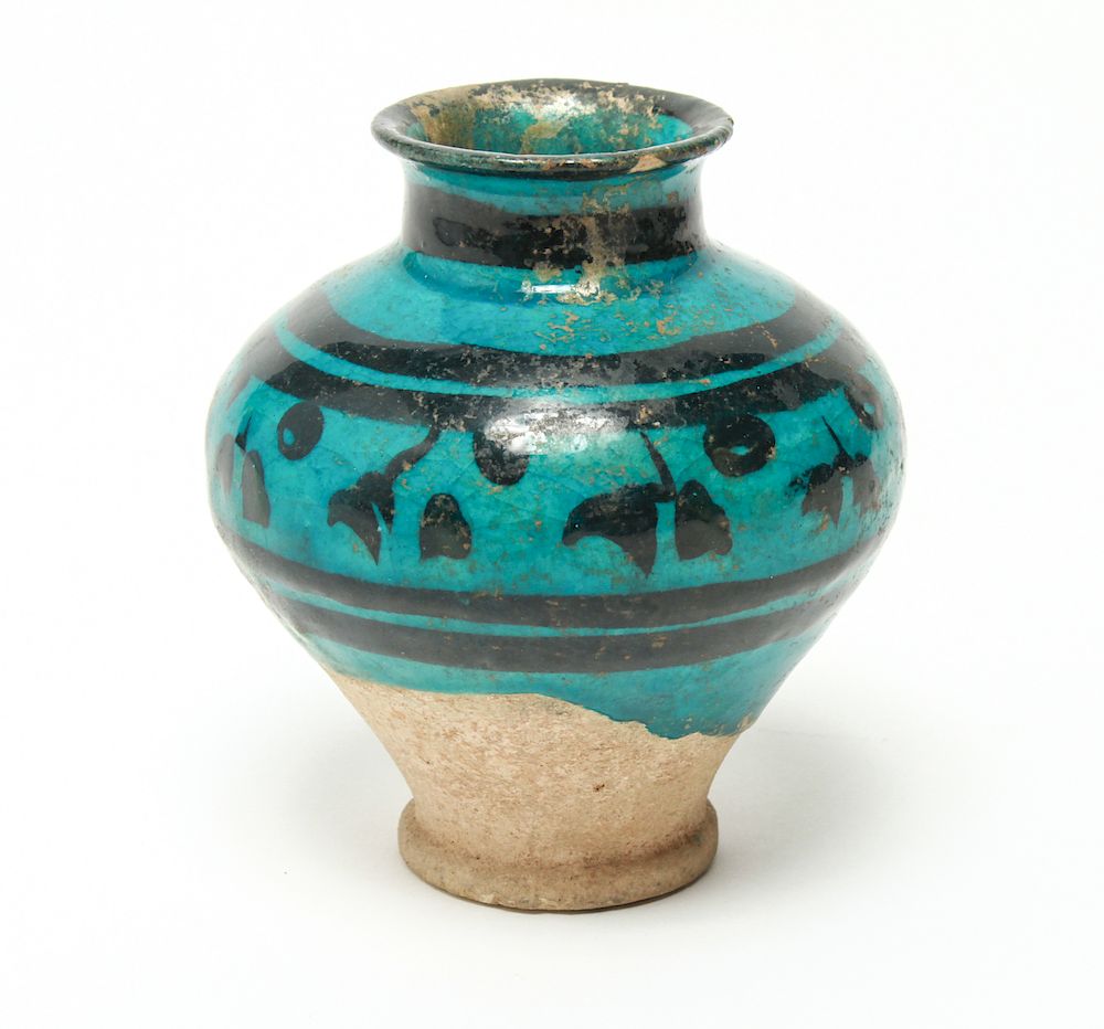 Appraisal: Kashan Turquoise Glazed Stoneware Pottery Vase Kashan Persian Iranian turquoise