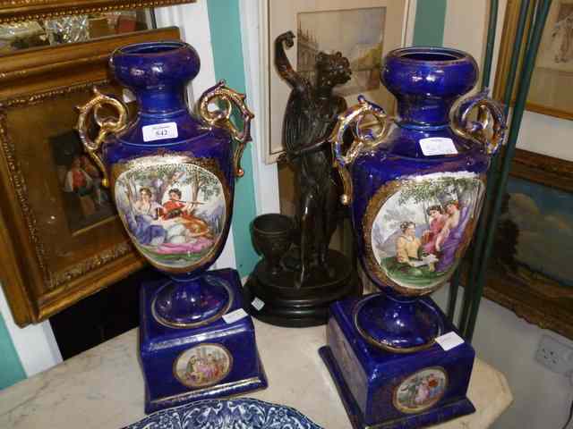 Appraisal: A PAIR OF BLUE GROUND CONTINENTAL POTTERY VASES of baluster