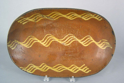 Appraisal: Redware loaf dish th c with yellow slip decoration h