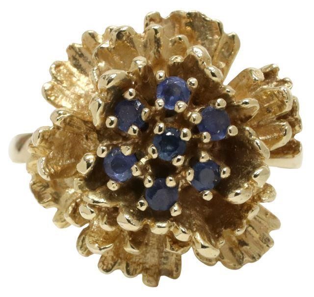 Appraisal: Estate kt yellow gold floriform ring set with seven round