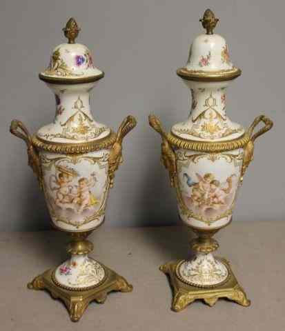 Appraisal: Pair of Possibly Sevres Bronze Mounted Urns A good quality