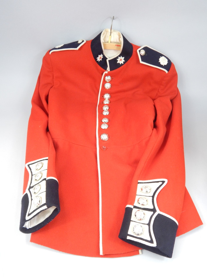 Appraisal: A military style Red Cross dress jacket with navy epaulettes