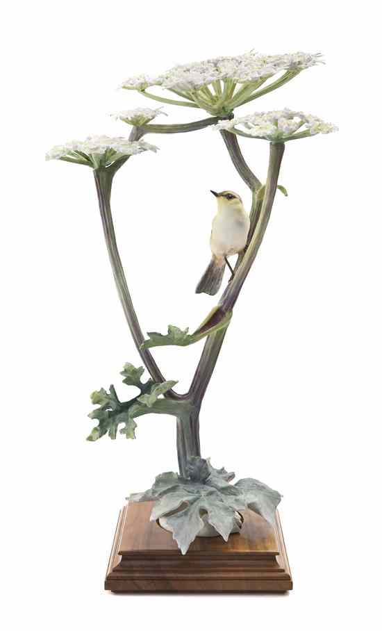 Appraisal: A Royal Worcester Dorothy Doughty Bird Chiff Chaff perched on