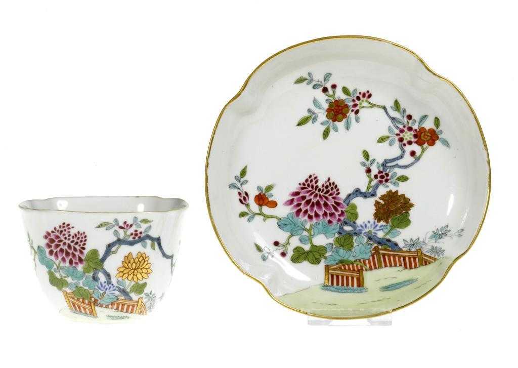 Appraisal: A DERBY QUATRELOBED TEA BOWL AND SAUCER painted in vivid