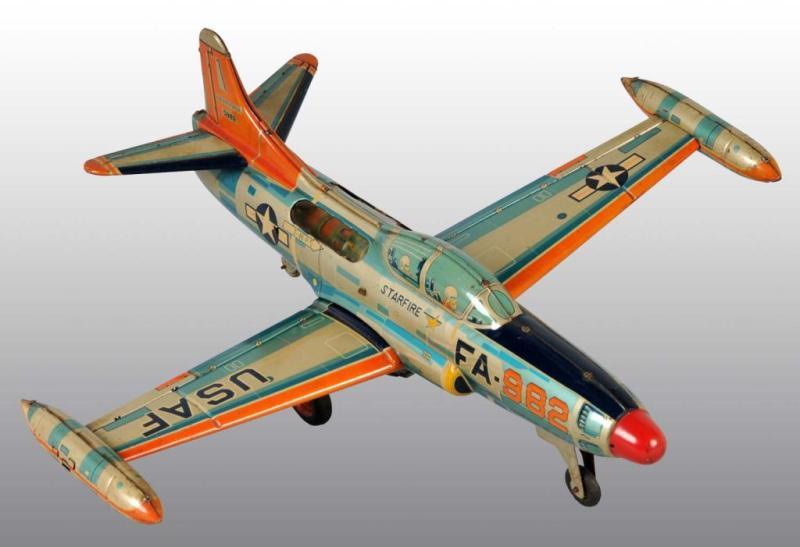 Appraisal: Tin Lockheed Airplane Friction Toy Description Japanese Working Marked USAF