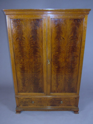 Appraisal: A mahogany double door wardrobe early th century the ogee