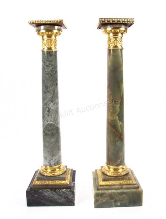 Appraisal: A pair of green marble column-form pedestals with k gold