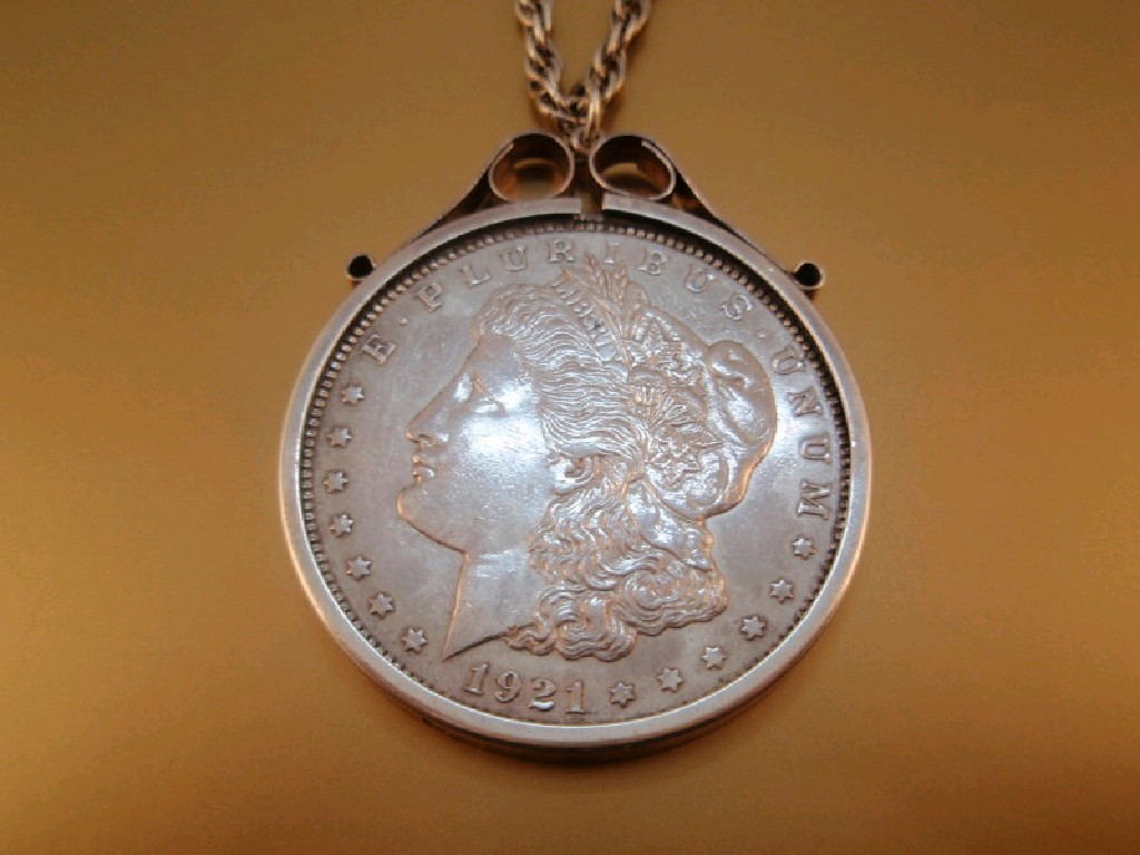 Appraisal: A American One Dollar coin set as a pendant with