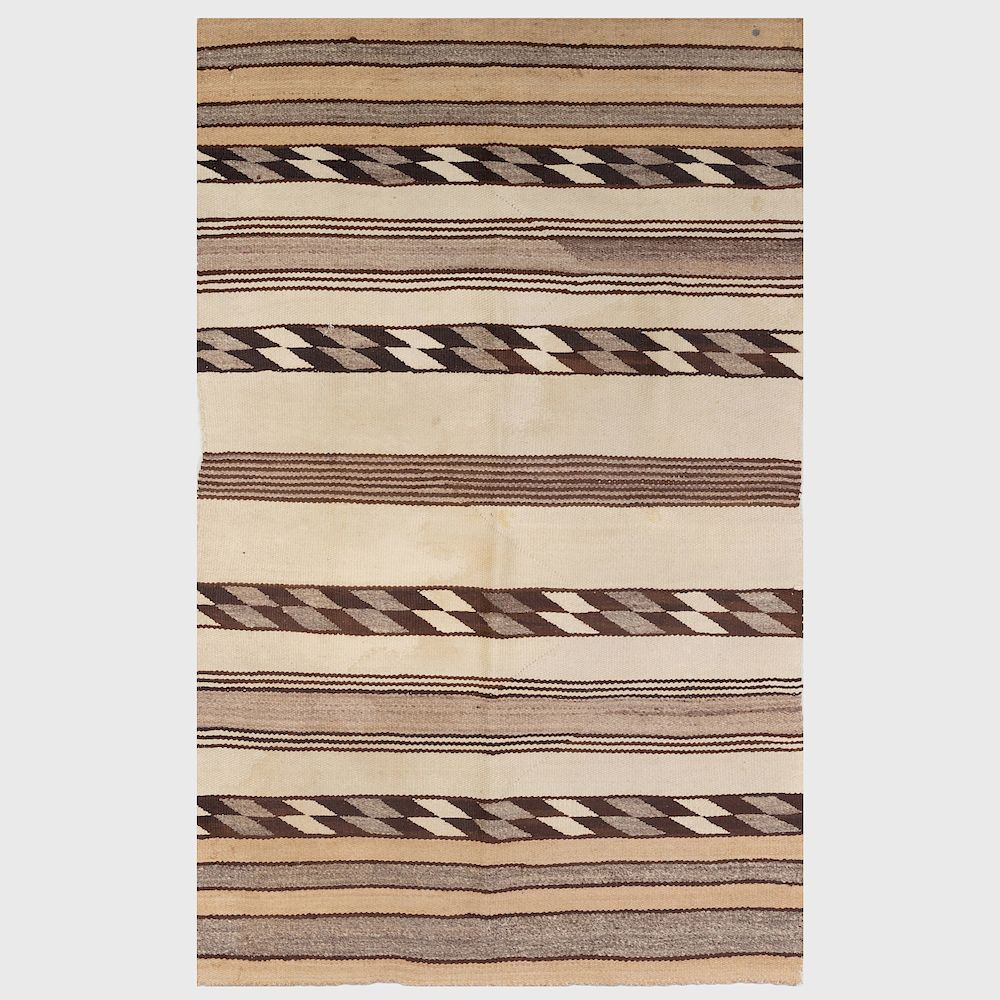 Appraisal: Navajo Woven Geometric Rug Woven in natural tones in x