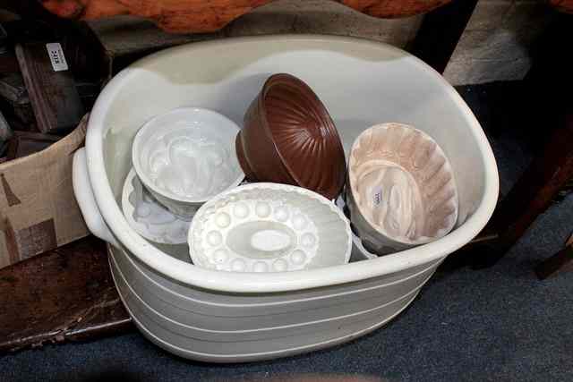 Appraisal: A COLLECTION OF TWENTY FOUR JELLY MOULDS of varying design