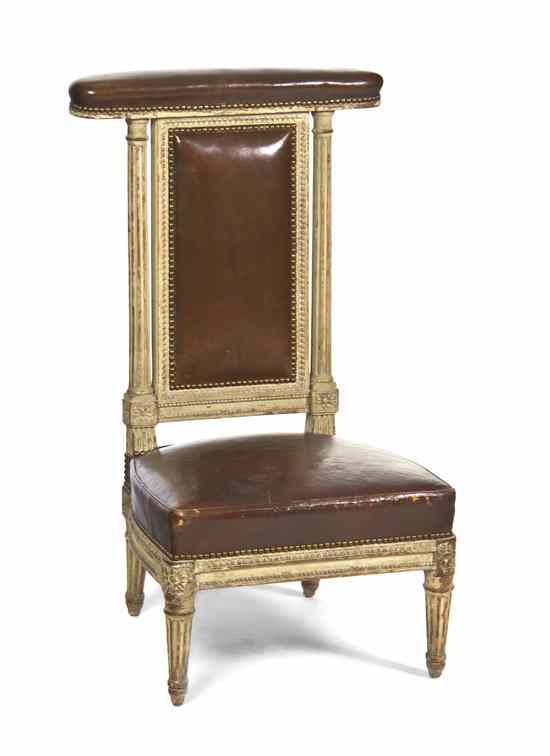 Appraisal: A Louis XVI Style Painted Prie-Dieu having a leather upholstered