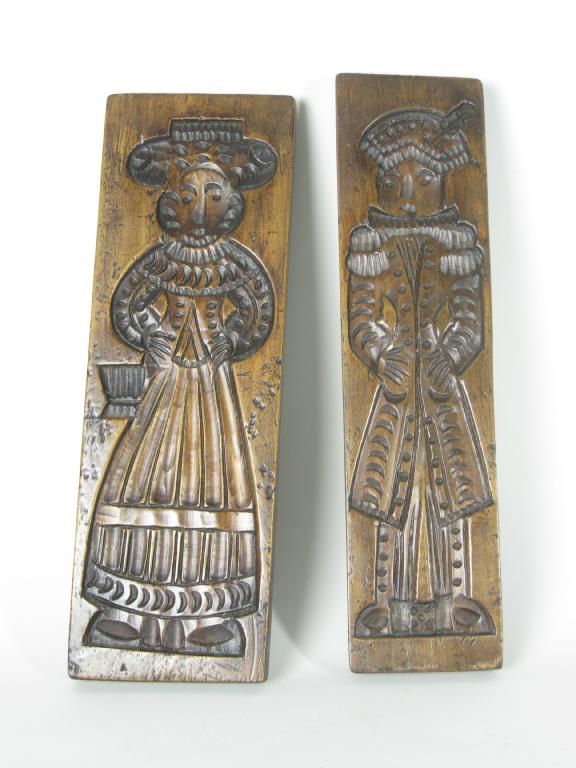 Appraisal: Pair of th th Century carved Biscuits Moulds in the