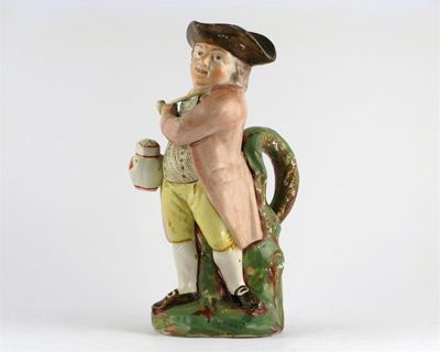 Appraisal: A pearlware Hearty Good Fellow jug the smoking toper standing