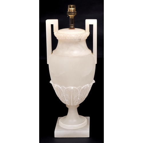 Appraisal: An alabaster vase shaped lamp th c cm h excluding