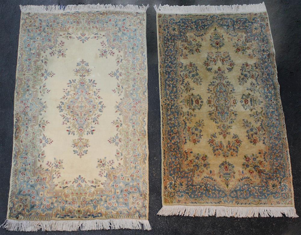 Appraisal: TWO KIRMAN WOOL RUGS OF SIMILAR PATTERN the first with