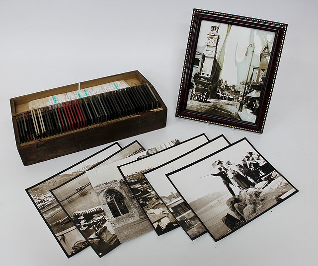 Appraisal: A PINE BOX OF GLASS PHOTOGRAPHIC PLATES depicting scenic views