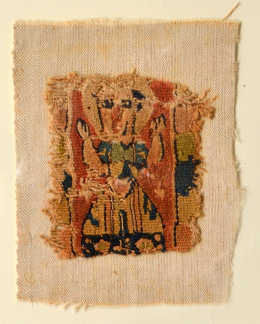 Appraisal: A RECTANGULAR FRAGMENT depicting a woman with upraised arms labelled