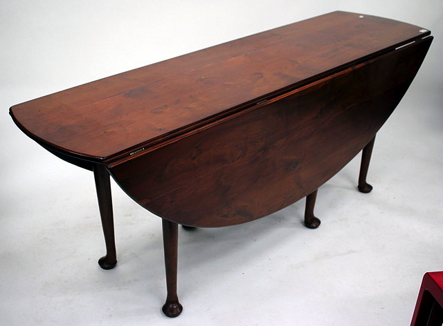 Appraisal: A MODERN YEW WOOD DROP LEAF WAKE TABLE with turned