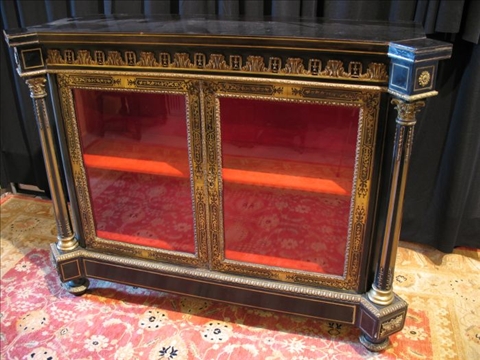 Appraisal: NAPOLEON III BOULLE EBONIZED CABINET Circa The ebonized rectangular top