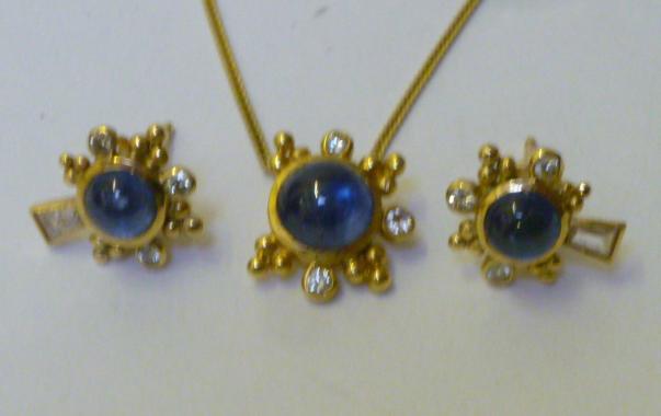 Appraisal: A SAPPHIRE AND DIAMOND EARRING AND PENDANT SET the cabochon