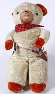 Appraisal: Cowboy teddy bear in fine condition tall original metal gun