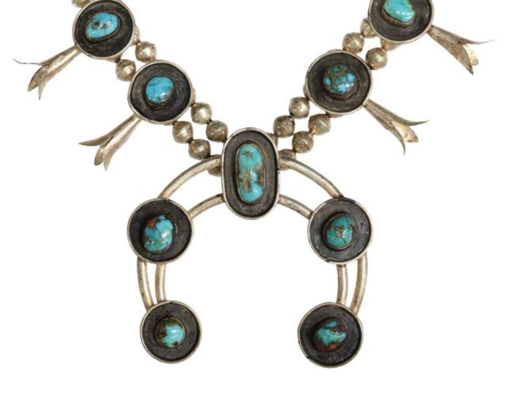 Appraisal: Native American silver content unknown squash blossom necklace twelve blossoms