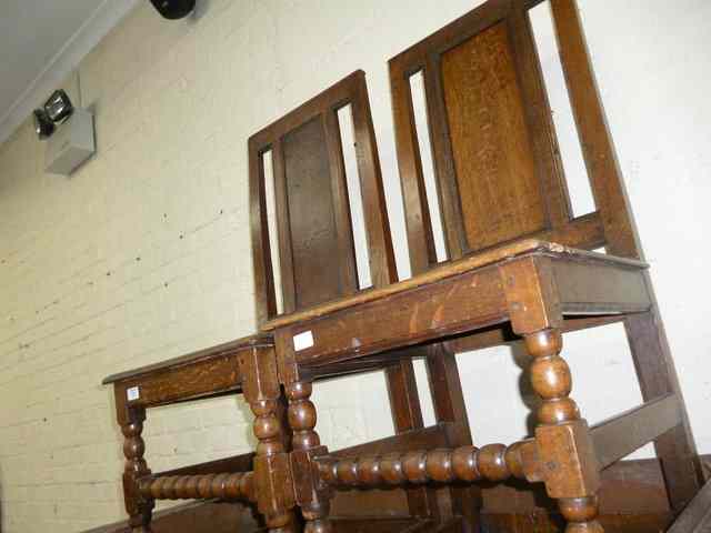 Appraisal: A PAIR OF TH CENTURY OAK HALL CHAIRS of pegged