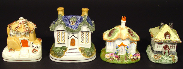 Appraisal: Three Victorian Staffordshire cottages two modelled as pastille burners and