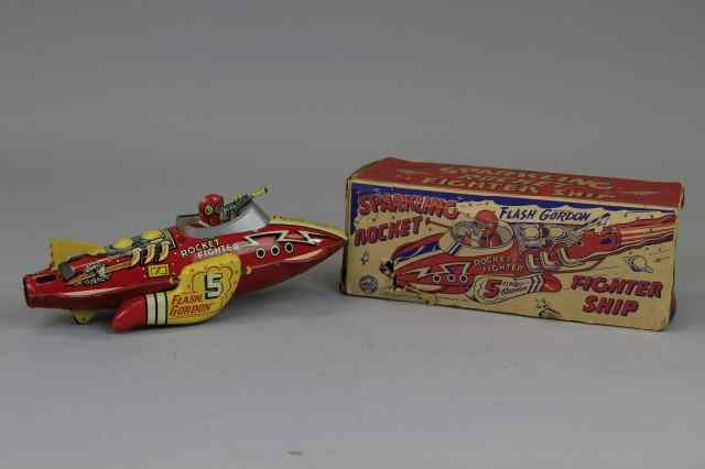 Appraisal: FLASH GORDON ROCKET FIGHTER Louis Marx boxed example lithographed tin