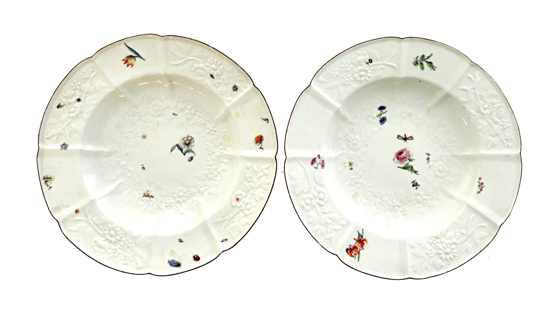 Appraisal: A pair of Chelsea soup plates circa painted with scattered