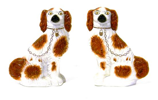 Appraisal: Pair of Staffordshire dogs red and white spaniels amber eyes