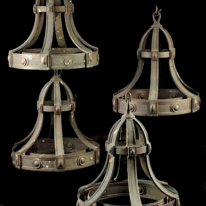 Appraisal: A SET OF FOUR PATINATED BRONZE TWELVE-LIGHT CHANDELIERS FROM THE