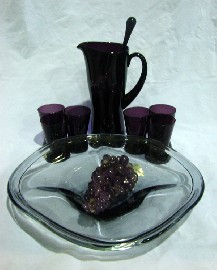 Appraisal: A Polish amethyst glass lemonade set comprising six tumblers a