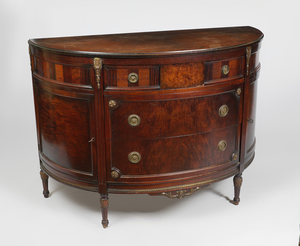 Appraisal: JOHNSON FURNITURE DEMI-LUNE CABINET Demi-lune shaped top front with banded