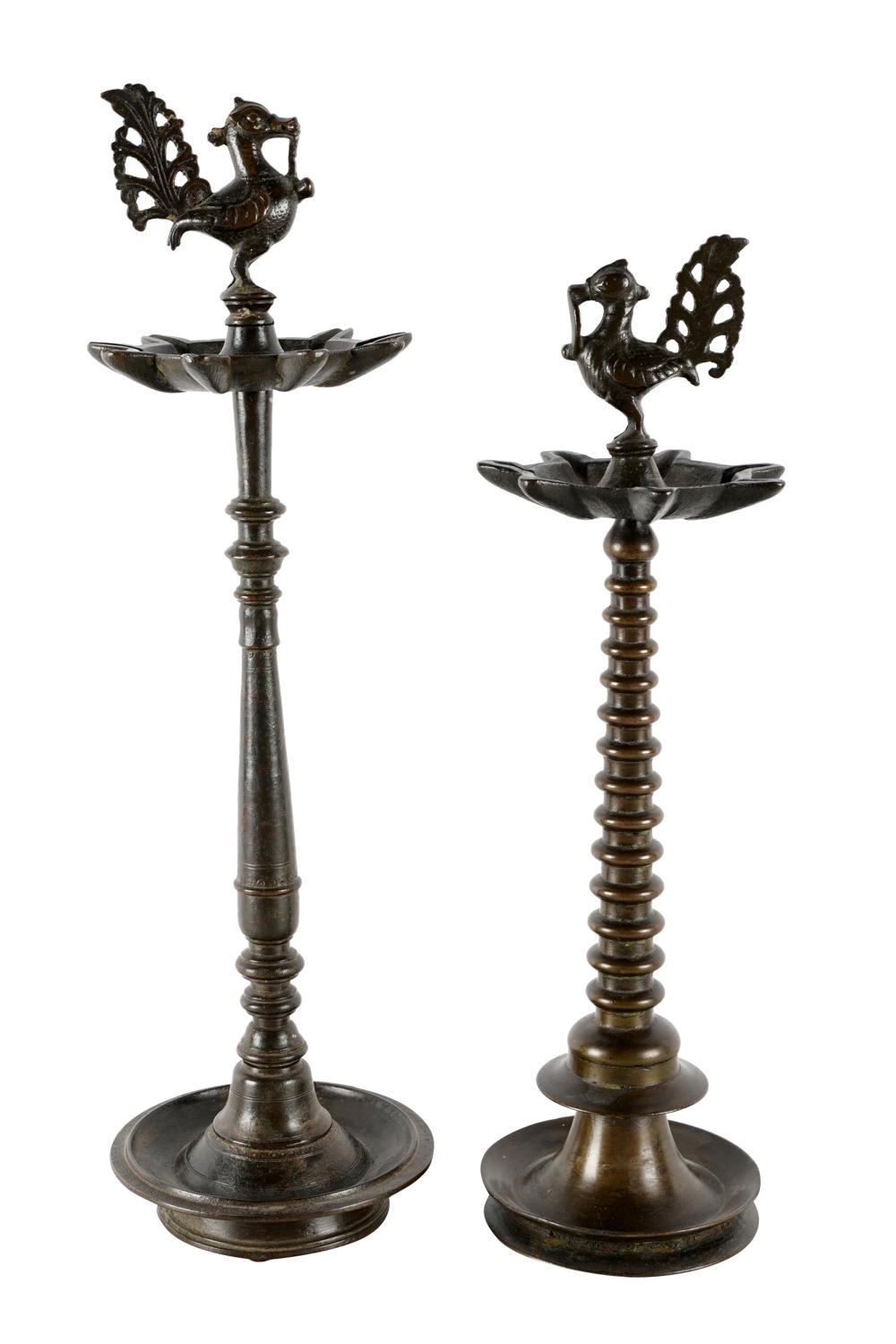 Appraisal: TWO INDIAN BRONZE OIL LAMPSof differing design each with animal-form