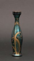 Appraisal: An Iridescent Glass Bud Vase ca Late th Century Amythest