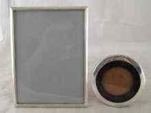 Appraisal: A silver photo frame with strut back by A E