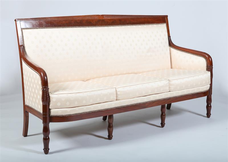 Appraisal: EMPIRE CARVED MAHOGANY SETTEE The slightly peaked top rail with