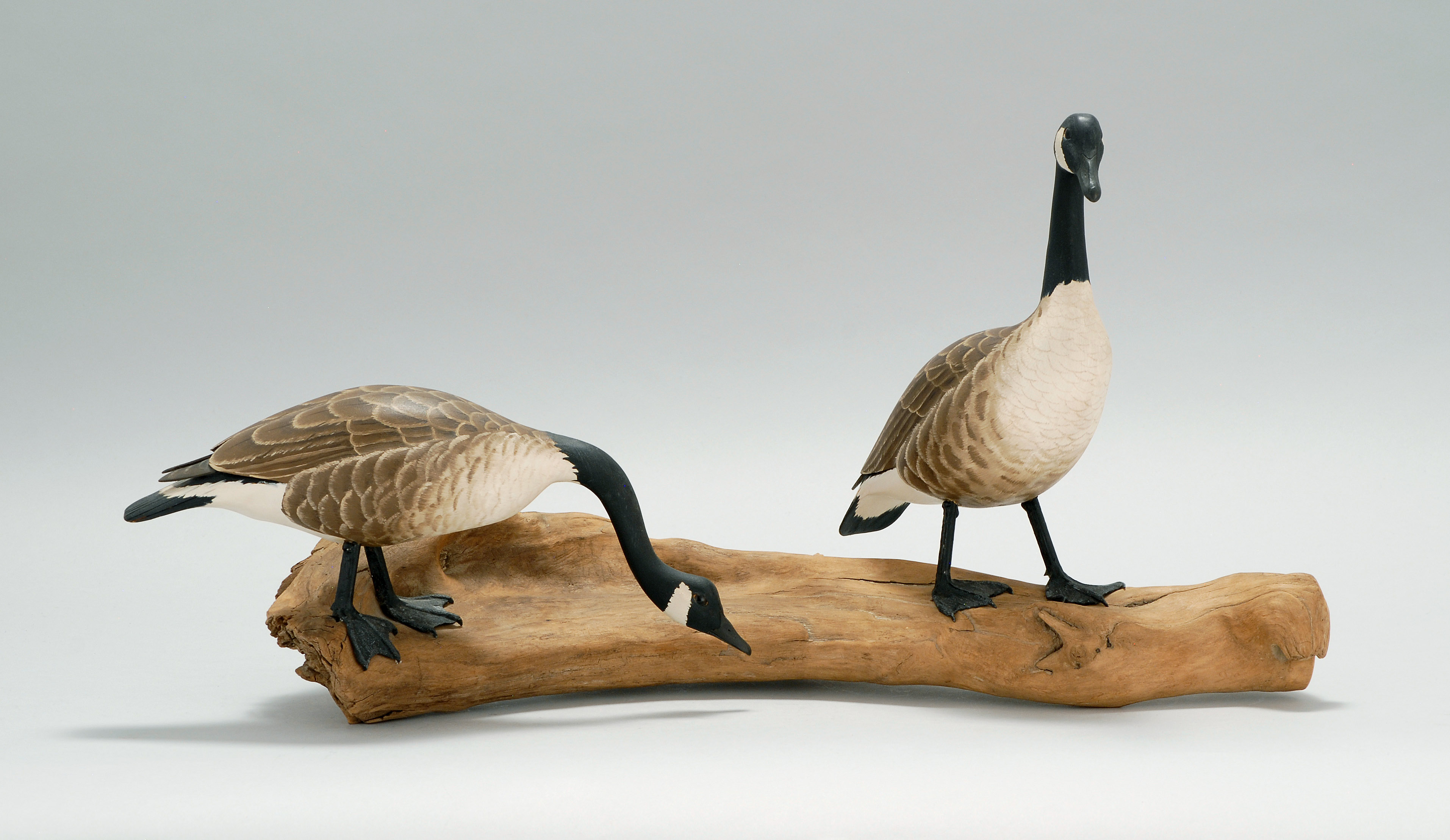 Appraisal: PAIR OF MINIATURE CANADA GEESE By Mark Holland of Brewster